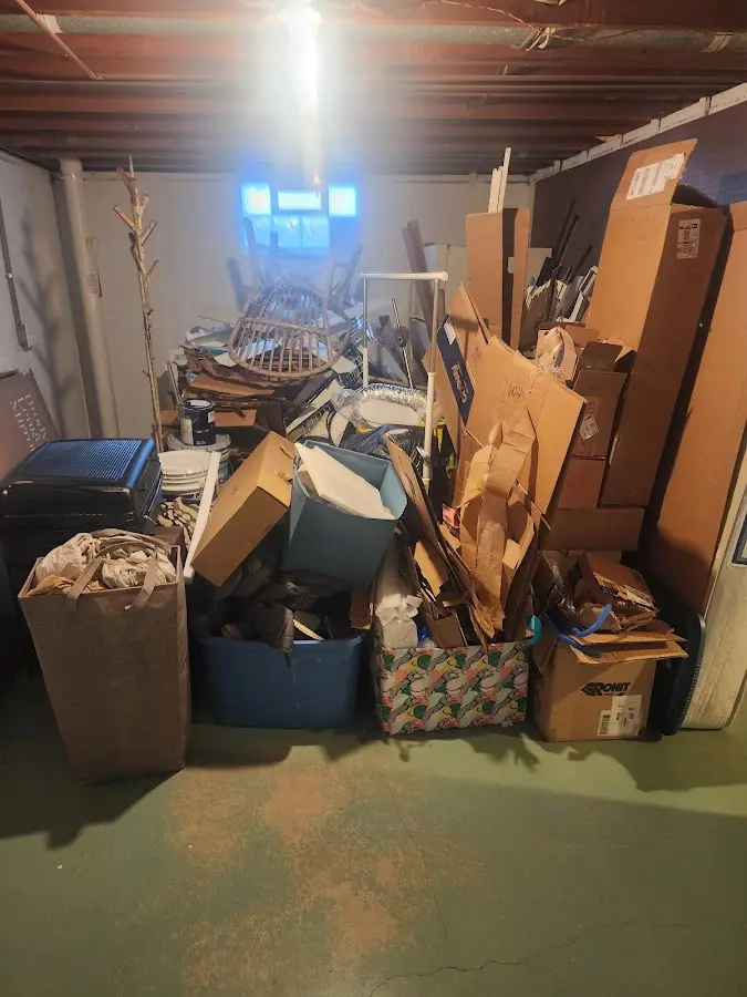 Roll-off dumpster container at job site for 4 Yard Dumpster Rental in Wells